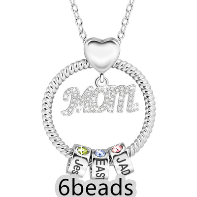 Silver necklace with 'Mom' pendant and three name beads on a white background 6  beads