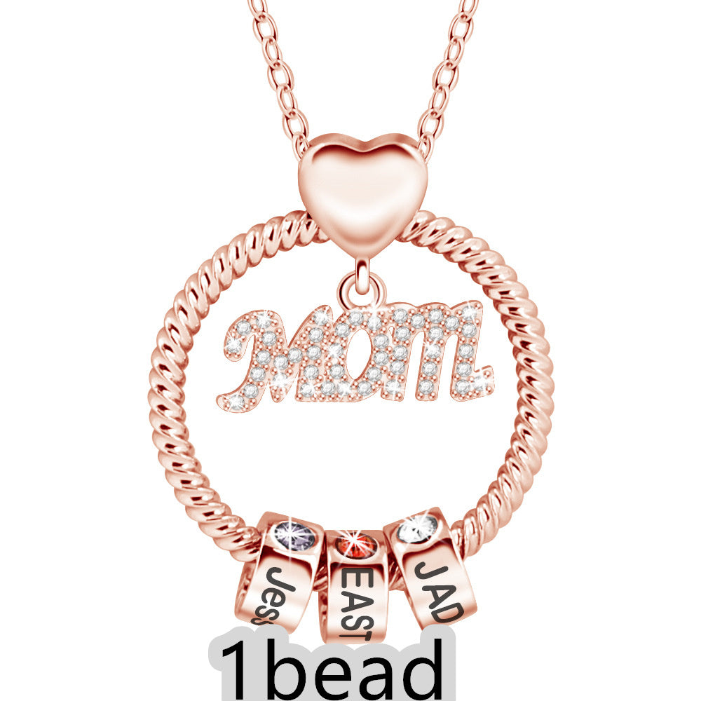 Rose gold necklace with 'Mom' and three name beads on a white background 1  bead