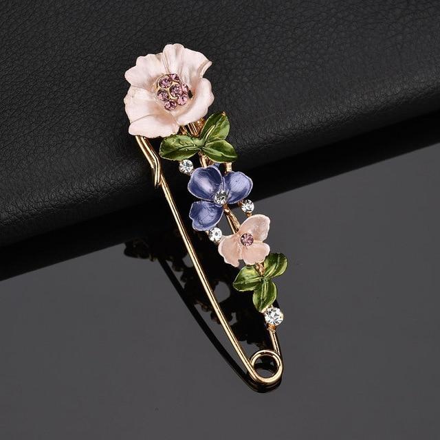 Decorative brooch with flowers on a black background