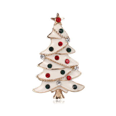 Christmas tree-shaped brooch with red, green, and gold colors on a white background