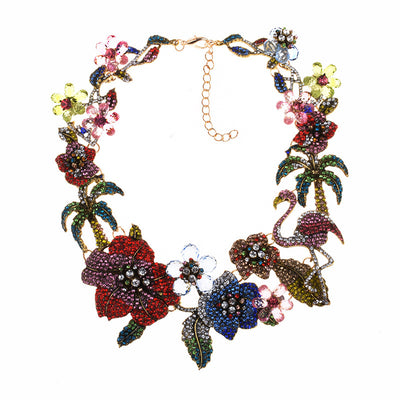 Colorful floral and flamingo necklace on a white background