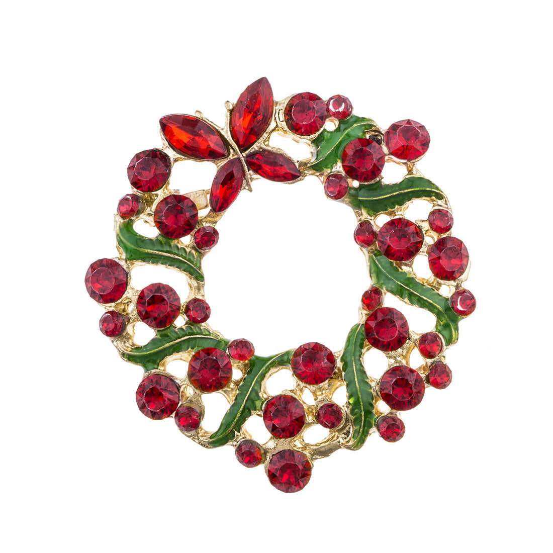 Christmas wreath brooch with red gemstones and gold accents on a white background