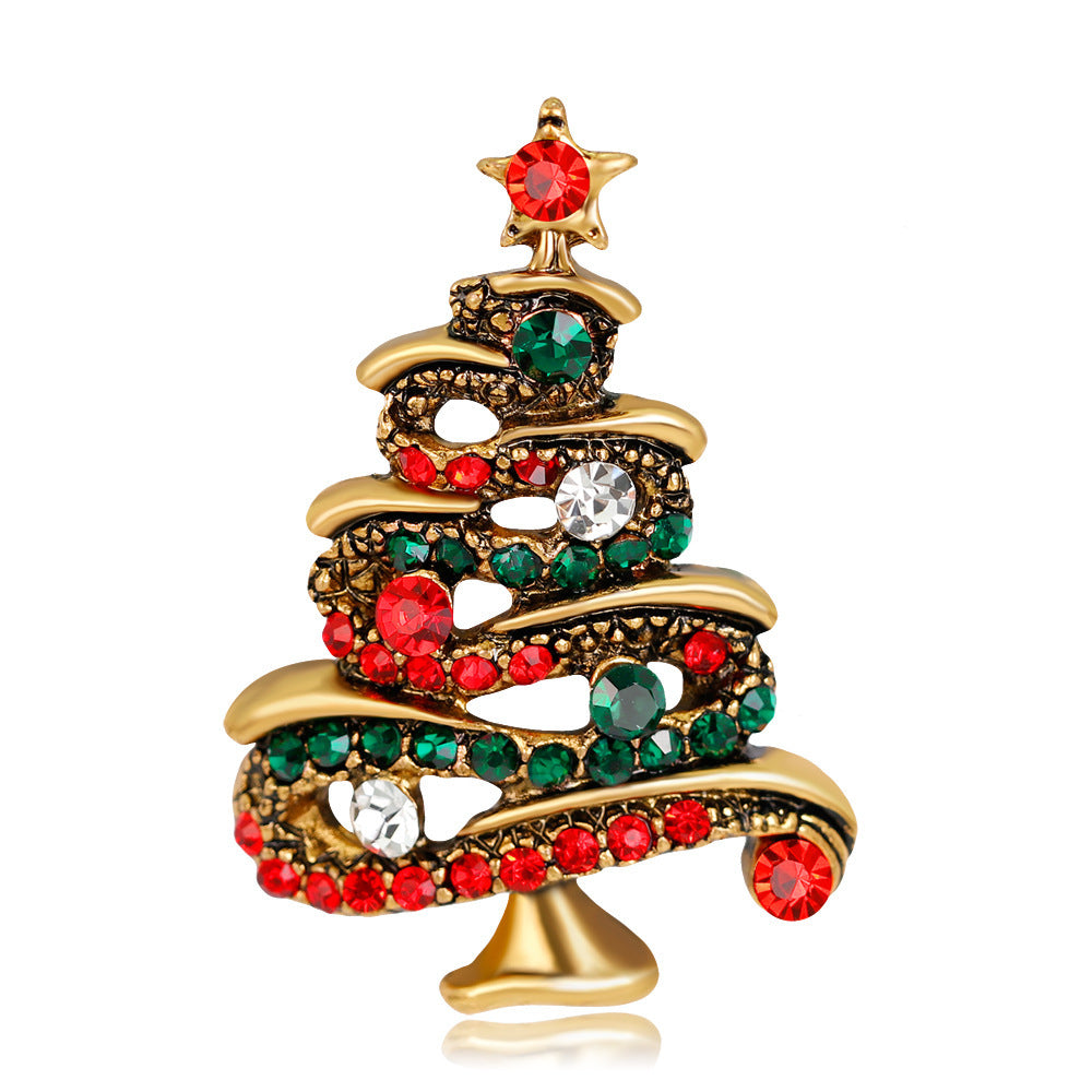 Decorative Christmas tree ornament with red and green gemstones on a white background