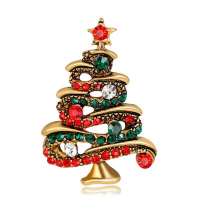 Decorative Christmas tree ornament with red and green gemstones on a white background
