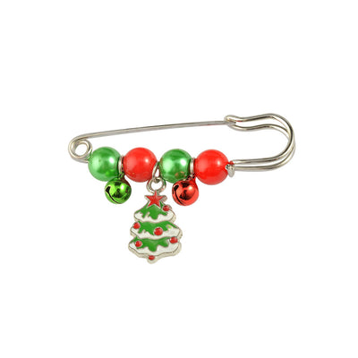 Christmas-themed safety pin with beads and a tree charm on a white background
