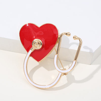 🩺 Heart Stethoscope Brooch — Red Enamel, Gold Tone