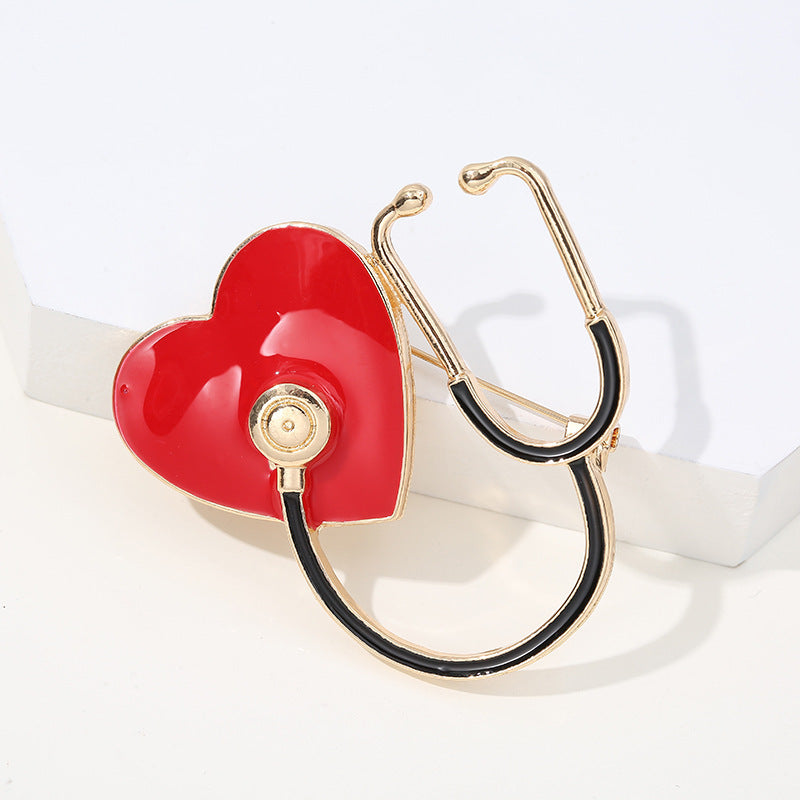 🩺 Heart Stethoscope Brooch — Red Enamel, Gold Tone