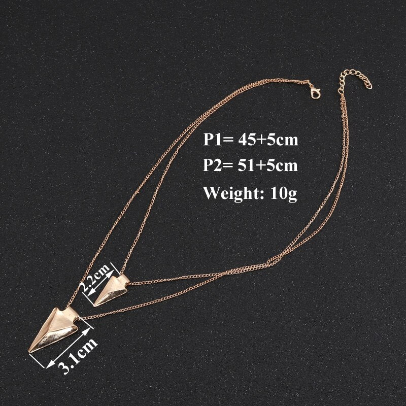 Rose gold necklace with measurements on a black background