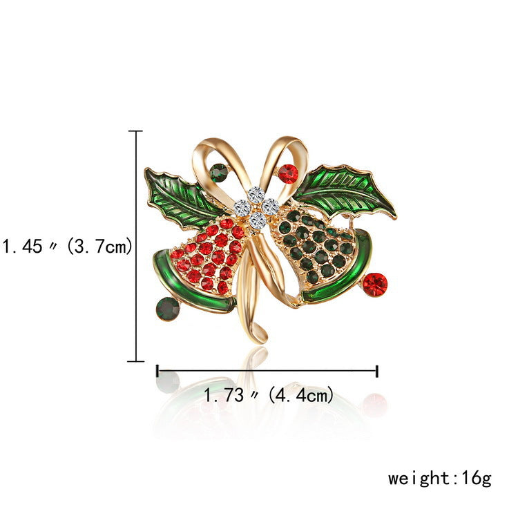 Decorative brooch with gemstones, leaves, and measurements on a white background