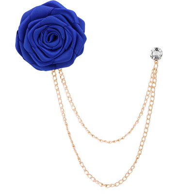 Blue flower brooch with gold chain on a white background