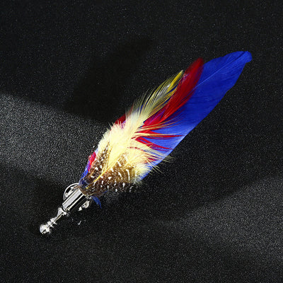 Colorful feathered cat toy with a black background
