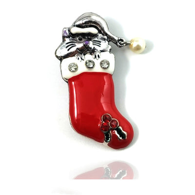 Red Christmas stocking charm with a cat face on a white background