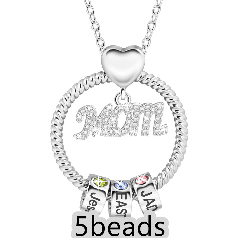 Silver necklace with 'Mom' pendant and '5 beads' text on a white background 5  beads