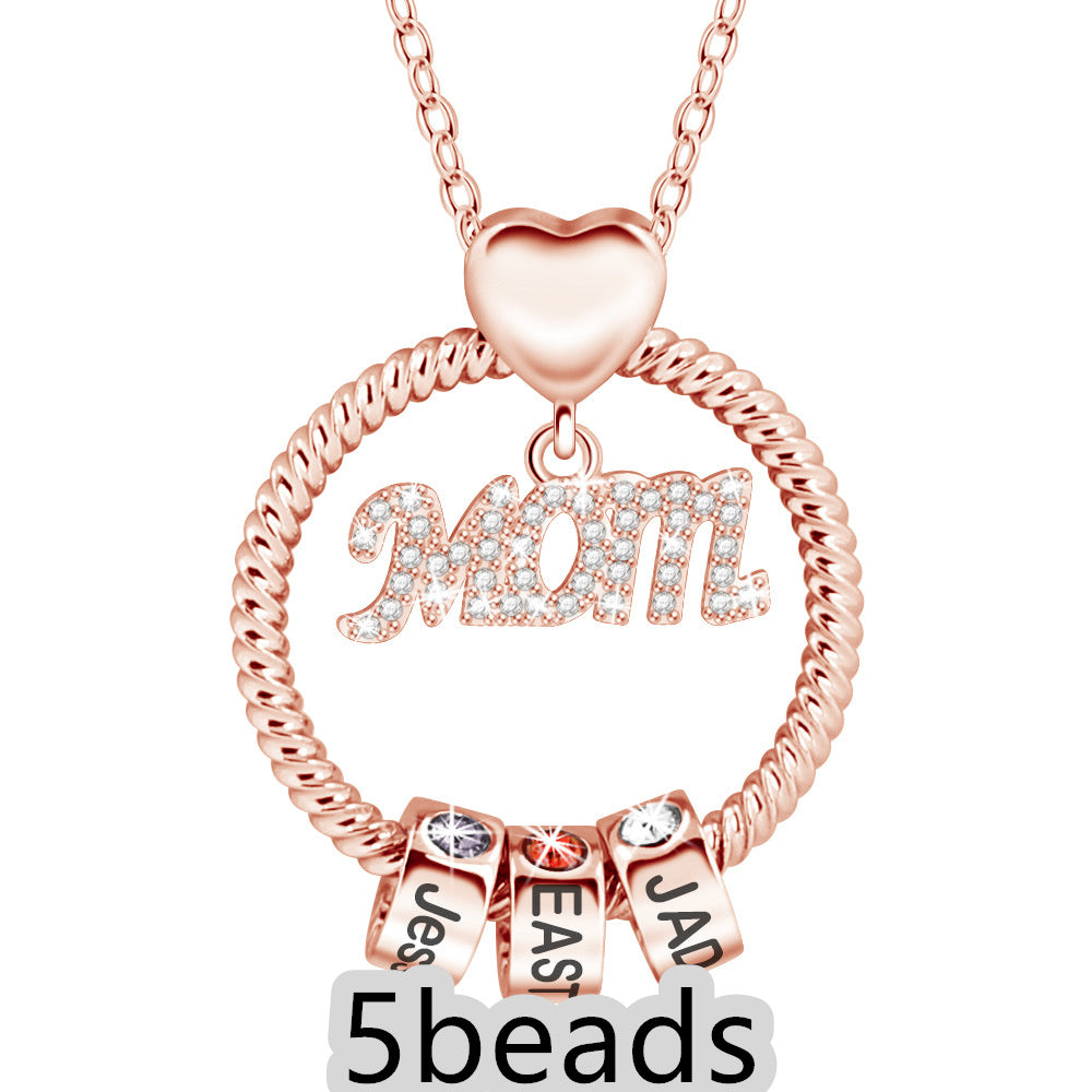 Rose gold necklace with 'Mom' and name charms on a white background 5 beads