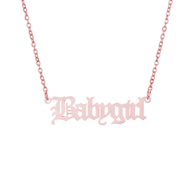rose color Necklace with 'Babygirl' pendant on a white background