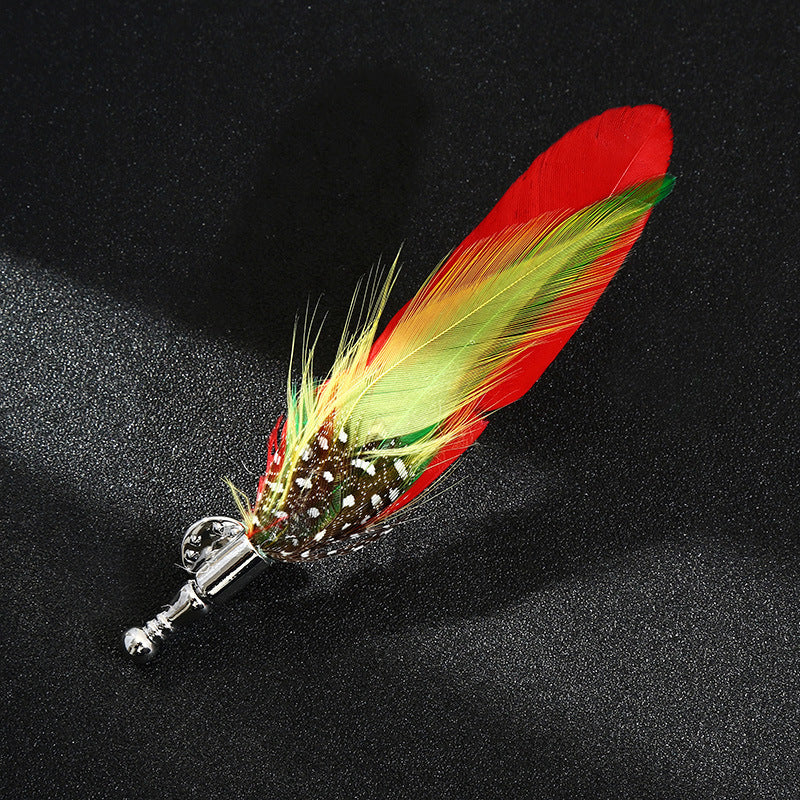 Feathered decorative item with a silver accent on a black background