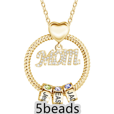 Gold necklace with 'Mom' pendant and name beads on a white background 5 beads