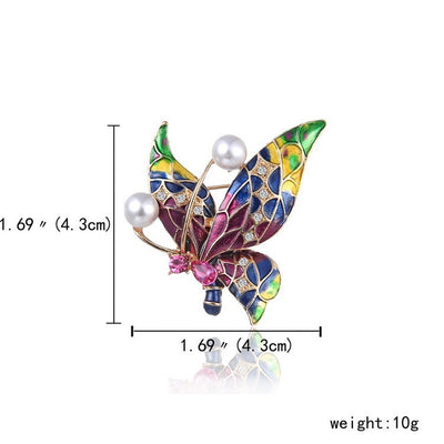 Colorful butterfly-shaped brooch with pearl and gemstone accents, shown with measurements and weight on a white background.