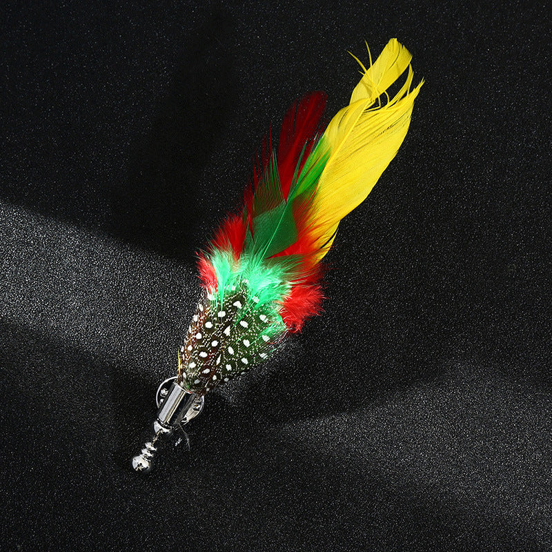 Colorful feathered cat toy with LED lights on a black background