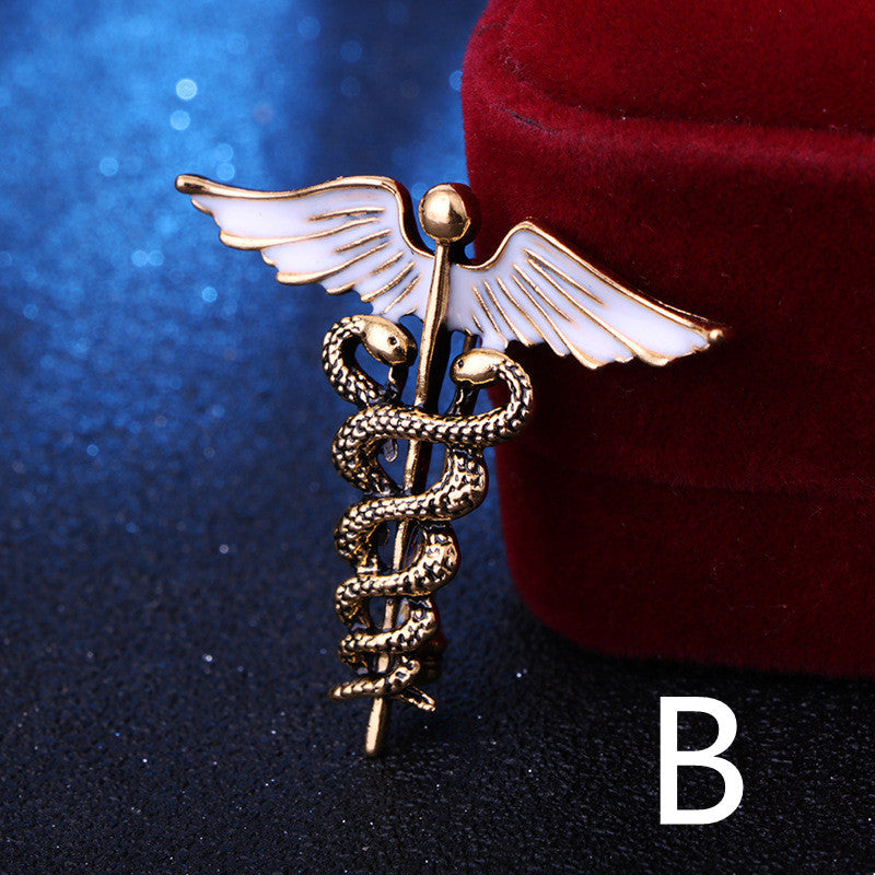 Gold caduceus medical symbol on a dark background