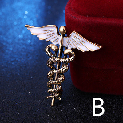 Gold caduceus medical symbol on a dark background