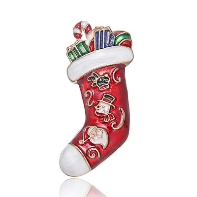 Christmas stocking brooch with candy cane and snowman design on a white background