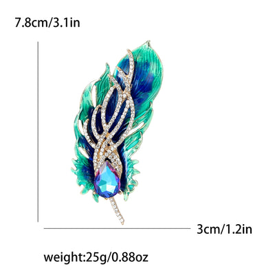 Colorful feather-shaped brooch with measurements and weight displayed