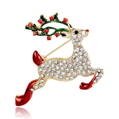 Decorative reindeer brooch with red and green accents on a white background