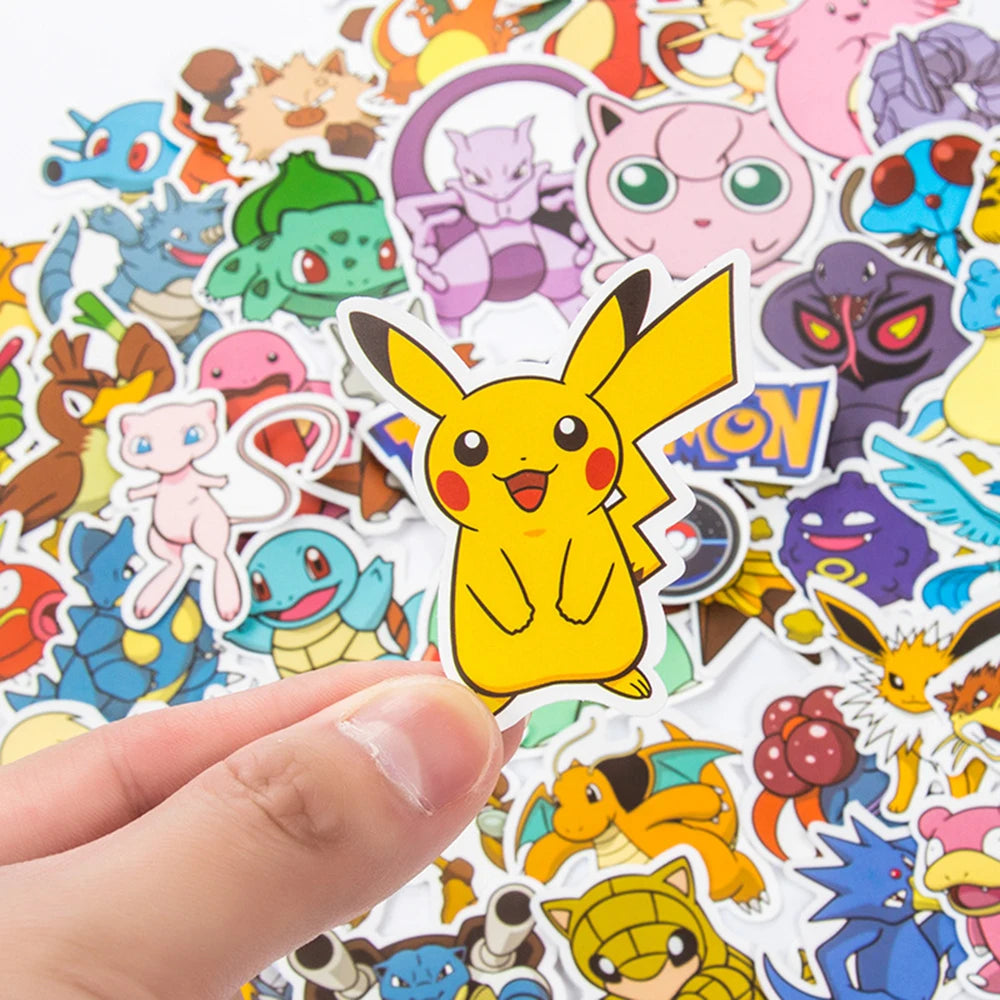 Collection of colorful cartoon stickers featuring various characters, with a hand holding one of them.