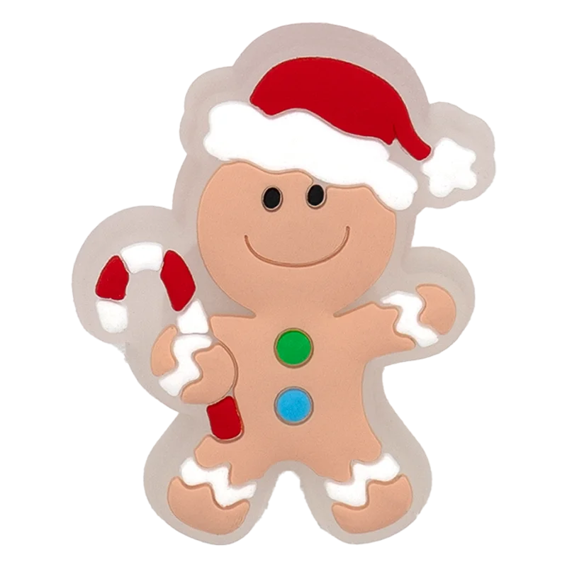 Gingerbread man cookie cutter with a red hat on a white background