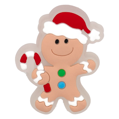 Gingerbread man cookie cutter with a red hat on a white background