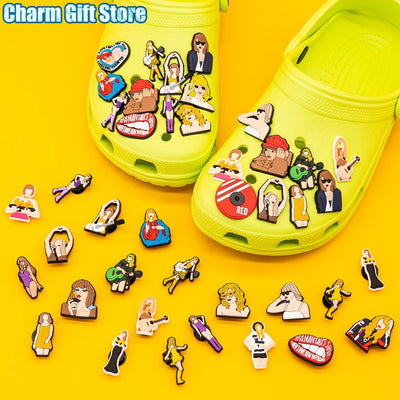 Yellow clogs with various charms on a yellow background, labeled 'Charm Gift Store'.
