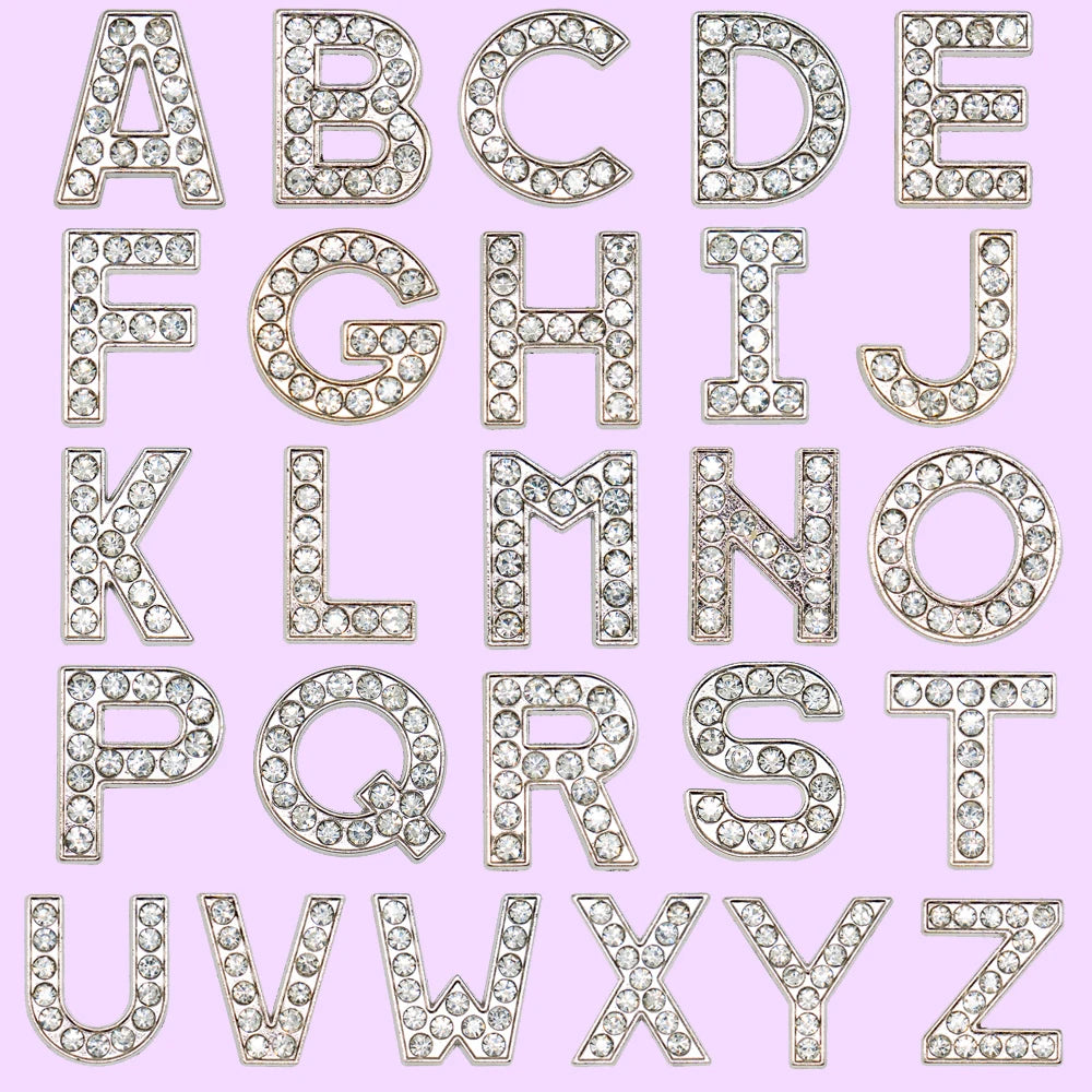 shoe charms Decorative metallic letters on a pink background