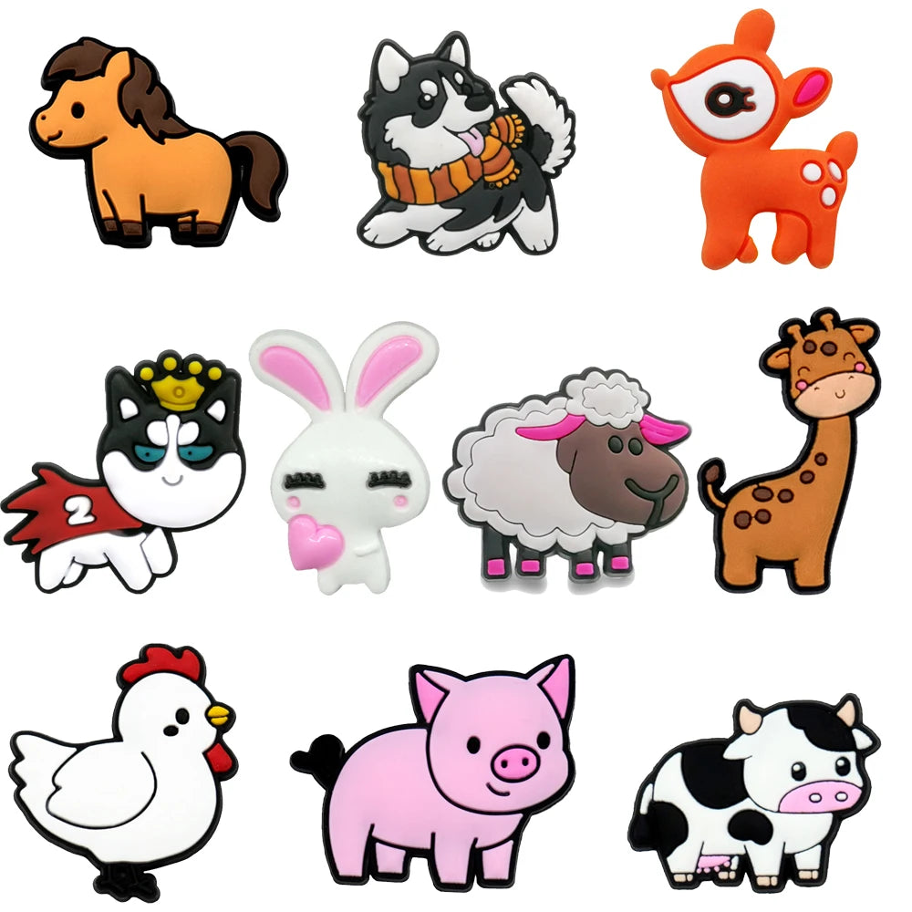 Set of cartoon animal shoe charms on a white background
