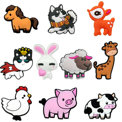 Set of cartoon animal shoe charms on a white background