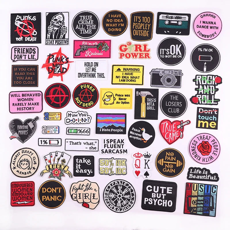 Collection of various stickers with different designs and text on a white background