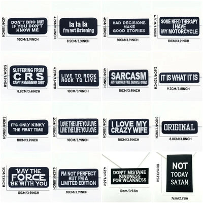 Collection of black stickers with white text on a white background