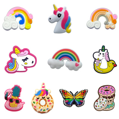 Collection of colorful cartoon character shoe charms on a white background