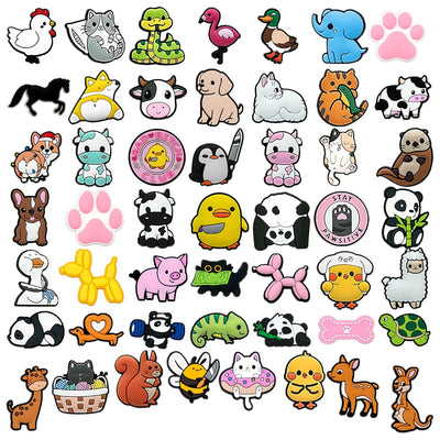 Collection of various cartoon animal and paw print shoe charms on a white background