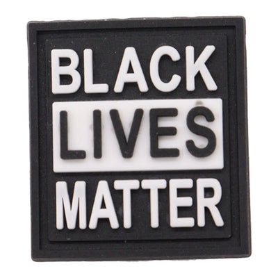 charm of a Black Lives Matter sign with white text on a black background
