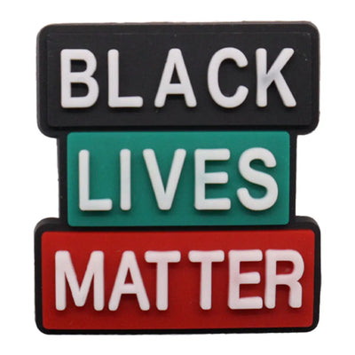 Charms of 'BLACK LIVES MATTER' text in white on a black, green, and red background.