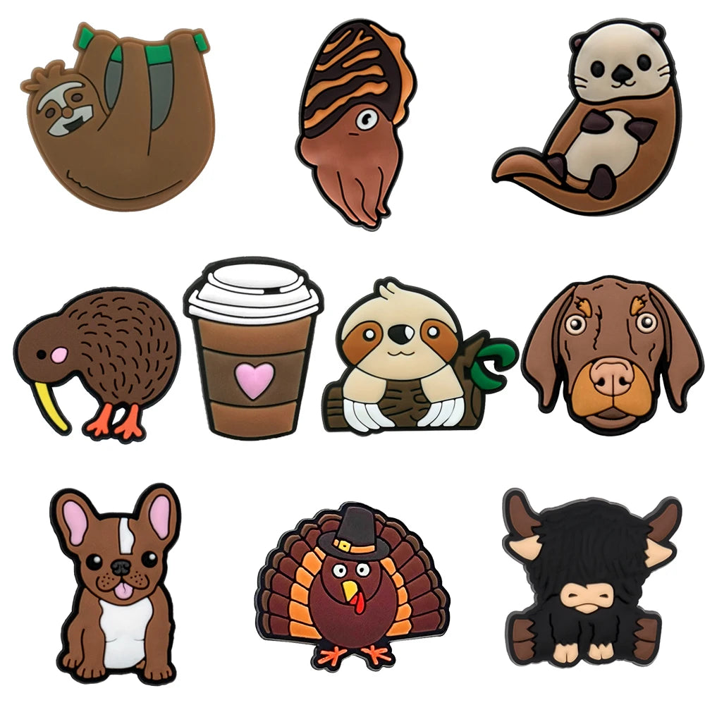 Collection of cartoon animal shoe charms on a white background