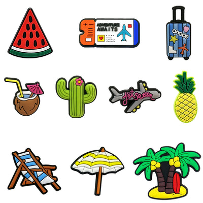 Collection of colorful travel-themed shoe charms on a white background