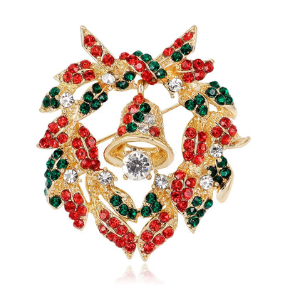 Decorative brooch with red, green, and gold colors on a white background