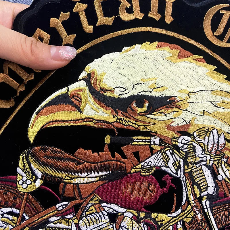 Embroidered patch with an eagle design on a black background