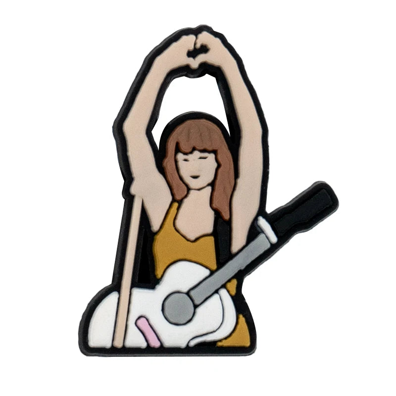 shoe charm of a woman holding a guitar with a white background