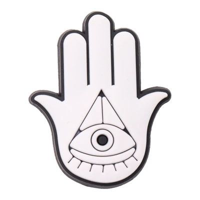 charm of Hamsa hand with an eye symbol on a white background