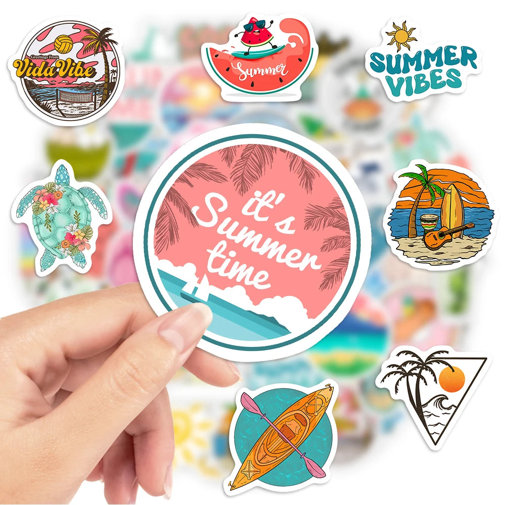 Hand holding a 'It's Summer Time' sticker with other summer-themed stickers in the background.