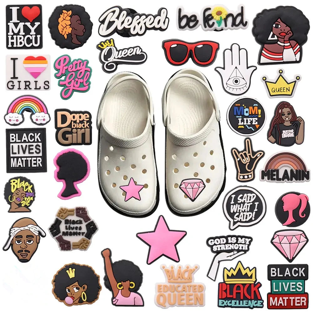 White crocs with various colorful charms on a white background