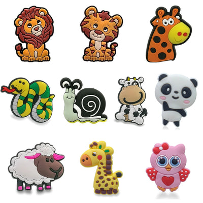 Set of colorful animal-shaped shoe charms on a white background
